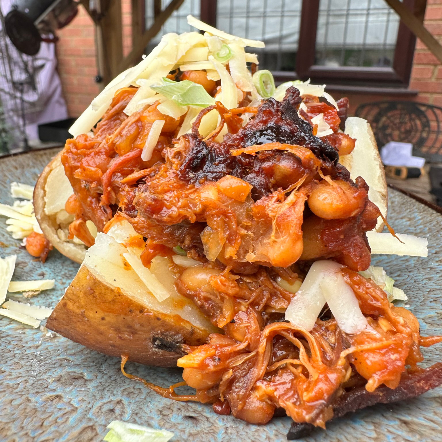Smoky Pit Beans with Candied Bacon, Pulled Pork, and Jacket Potatoes