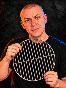Lee Bishop holding a grill grate on the UK BBQ news cover for 16 October 2026, with the headline Char-Broil and Pit Boss Europe exit.